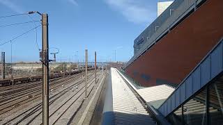 GBRf 66790 and freighttrain with 2 axle sandwagons leaving Doncaster 17.10.2022.