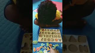 Alex is learning Alphabets by Montessori Educational Learning  letters puzzle Board#learningbydoing