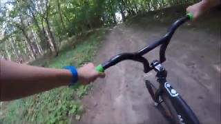 Downhill BMX Bombing a dirt descent