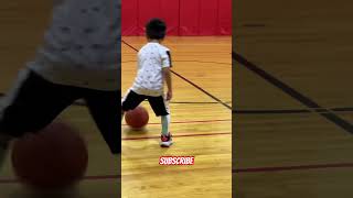 My 6 year old brother is good on dribbling the basketball ball.