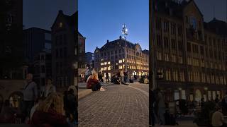 After a day of exploring Amsterdam. People-watching in Dam Square 😁