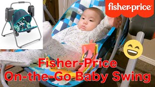 5 month-old baby Ty in a On-the-Go Baby Swing by Fisher-Price