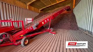 Storeloading onions with the Tong SwiftLift Extendo elevator | Extending & slewing elevator