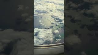 Two planes above the great ocean