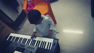 My daughter  playing keyboard at age 2.5 year