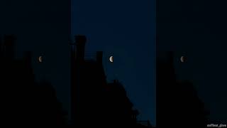 Moon above roof