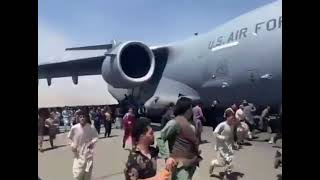 Shocking Video from Kabul Airport/ Afghans travel hanging outside of American Plane / Dharam Veer