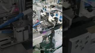 Automatic medical IV infusion extension tube coiling winding rolling and pouch bag packaging machine