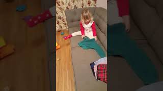 Emma | 3 years old | folding clothes