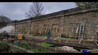 Our gardener greets our new glasshouse