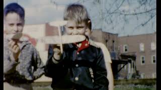 1958 Friends in Yard playing with balsa airplanes