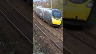 390127 heads south on the curve at Barton