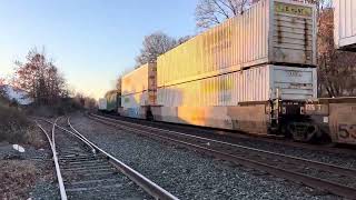 NS 8148 ES44AC leads NS 28X through Piscataway