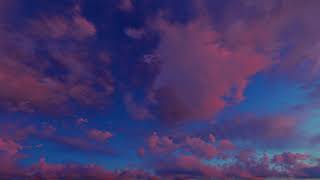 ( CGI 4k Stock Footage ) Tropical purple epic sunset clouds