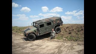 Installing rear Jeep Wrangler Bench Seat in Humvee with seat belts.