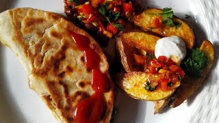 Mexican quisadillas with potato wedges ,orange salsa and sour cream