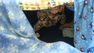 Christian going crazy in his blanket fort