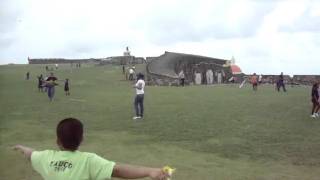 Kids flying kites at San Felipe del Morro in San Juan, PR