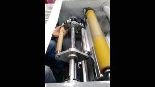 Semi-automatic aluminum foil roll rewinding machine