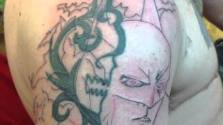 Batman coverup tattoo by Mike McHenry from Studio 1900