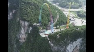 Giant swing opens to public on edge of 700 meter high cliff in SW China