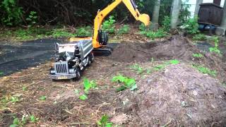 Rc excavator and dump at work