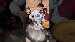 Grandma cooking pork belly