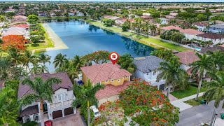 Gorgeous French Mediterranean-style home in Miami's Crestview Lakes Community... 6641 SW 166 CT