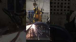 Mahajan Automation plasma cutting by refurbished Fanuc R-2000iA/165F robot