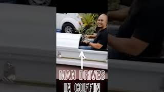 Man Drives in Coffin