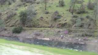 Driving along Merced River outside Yosemite, CA