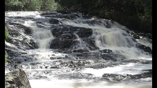 Visiting waterfalls while camping at Ivanhoe Lake Provincial Park