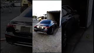 Mercedes Benz | loading im container to ship