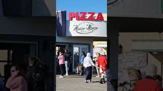 Red Coat and wife at the boardwalk