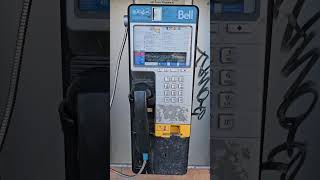 A telephone box in a plaza is rare now.