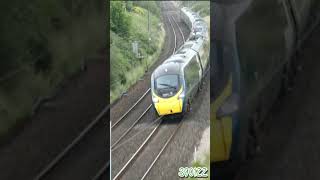 390122 flies through Forton curves on the WCML making up time