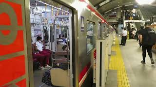 Watching Osaka Metro at Shinsaibashi station in Osaka