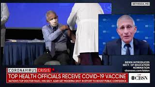 Fauci grabs the wrong arm