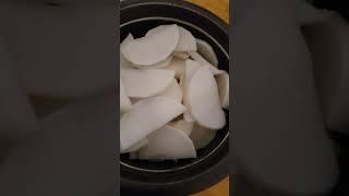 Slice Daikon radish into half circle.