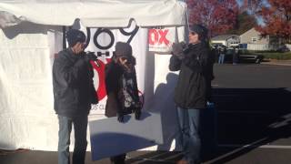 The FM99 and 106.9 the Fox announcement of meals collected at Mayflower Marathon