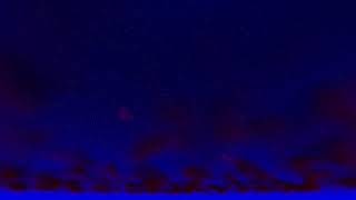 ( CGI 4k Stock Footage ) Dark red blue calm dramatic night star sky fantasy clouds seamless loop