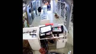 Cow goes into shop