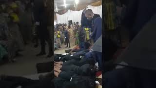 A Pastor flogging Church members for deliverance.