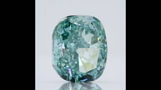 0.51 ct FANCY VIVID BLUE GREEN I1 CUSHION GIA