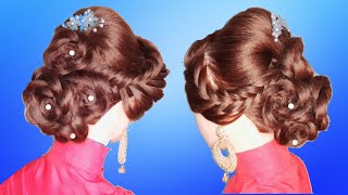 Bridal hairstyle for long hair | wedding updo with bun of braided flowers