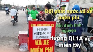 Đội phát nước - Hút đinh - Vá xe MIỄN PHÍ  . Hướng QL1A về miền tây | Vịt Xiêm Vlog