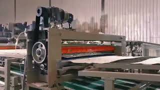 auto clipeer rotary spindleless with stacker