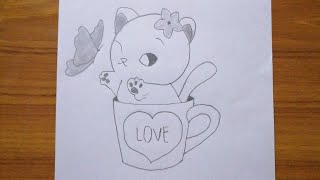 Baby kitten inside love cup playing with butterfly