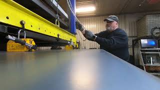 Moving a 12ga sheet of steel from my storage rack to the CNC plasma table