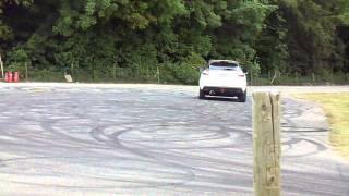 Terry Grant doing a doughnut in reverse goodwood festival of speed 2015